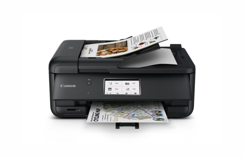 Canon PIXMA TR8620 all-in-one printer with touchscreen printing a colour map document