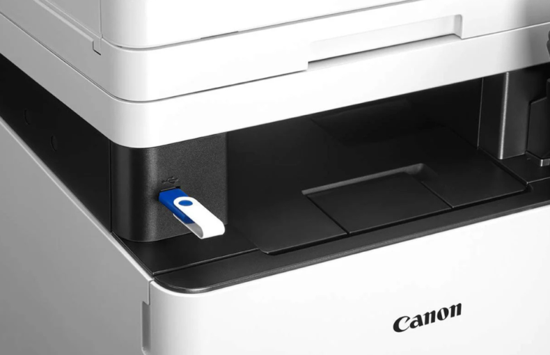 USB flash drive plugged into the front USB port of a Canon printer