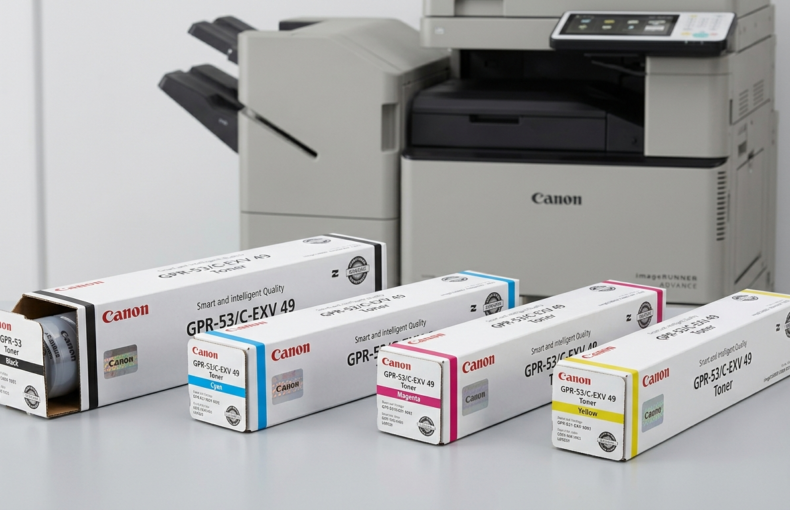 Canon GPR-53/C-EXV 49 toner cartridges in black, cyan, magenta and yellow beside a Canon imageRUNNER ADVANCE printer